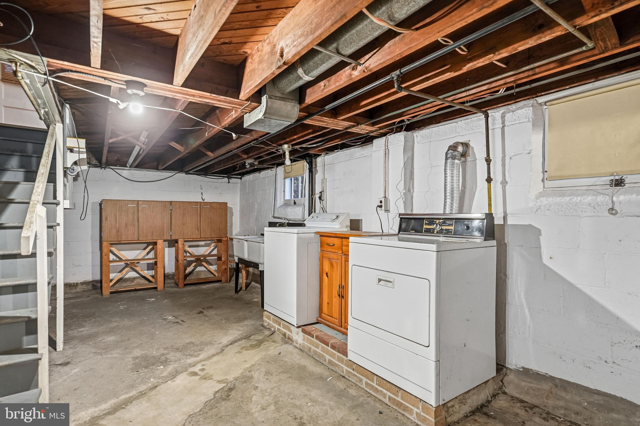 101 6th Avenue Mount Ephraim, NJ 08059 - Photo 20 of 27 a view of storage and utility room with washer and dryer