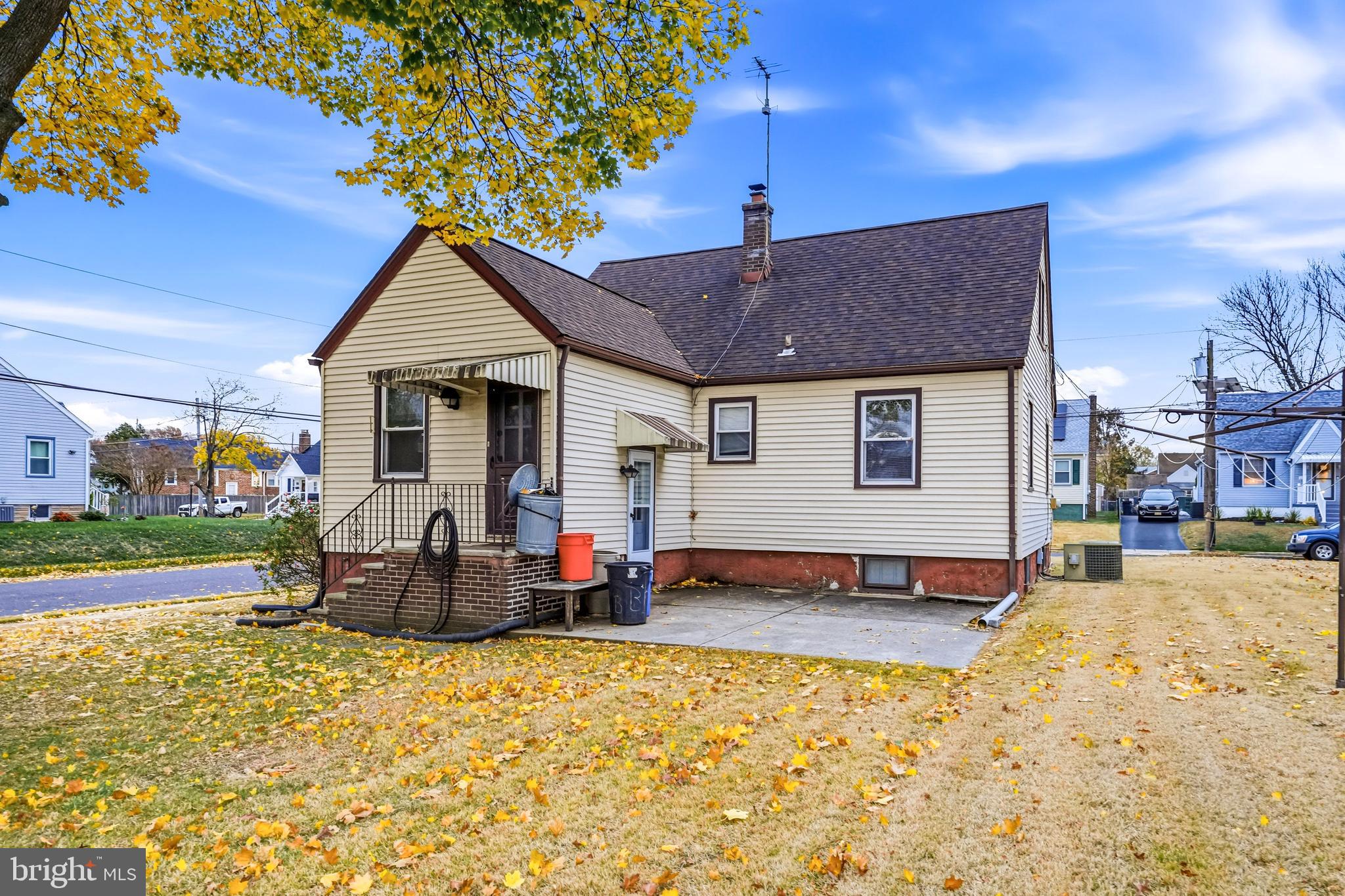 101 6th Avenue Mount Ephraim, NJ 08059 - Photo 25 of 27 a view of a house with backyard and sitting area