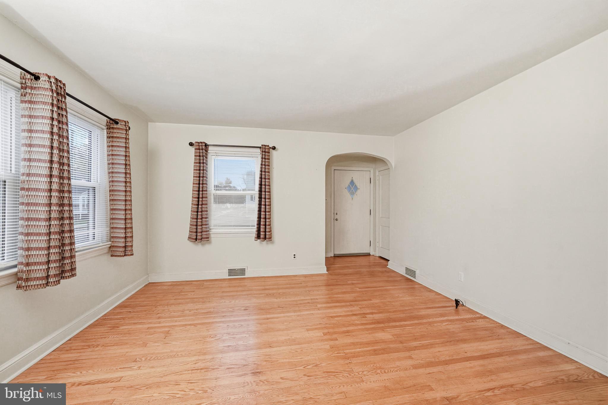 101 6th Avenue Mount Ephraim, NJ 08059 - Photo 5 of 27 a view of an empty room with a window