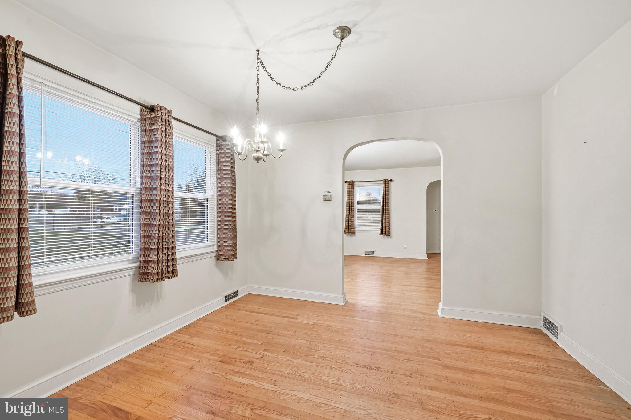 101 6th Avenue Mount Ephraim, NJ 08059 - Photo 9 of 27 a view of a room with wooden floor and windows