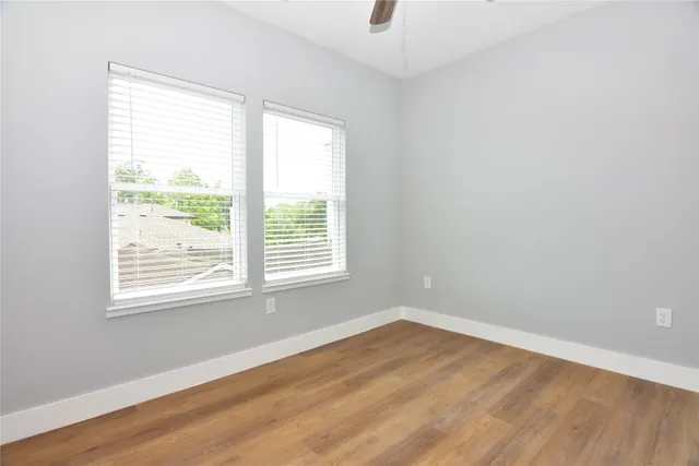 a bathroom with a shower and a shower