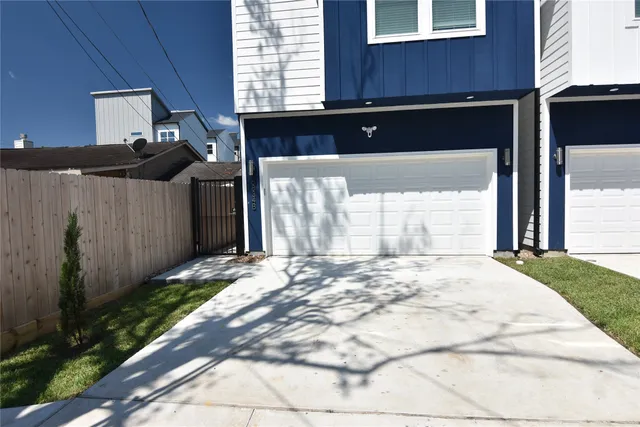 a view of a house with a door and a garage