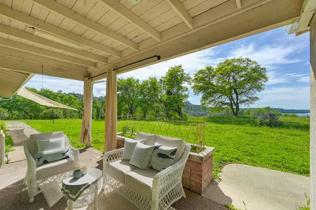 a view of yard with patio