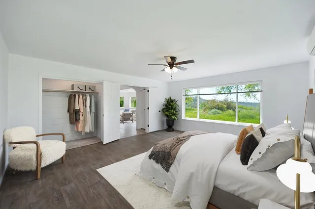 a bed room with a bed and a couch