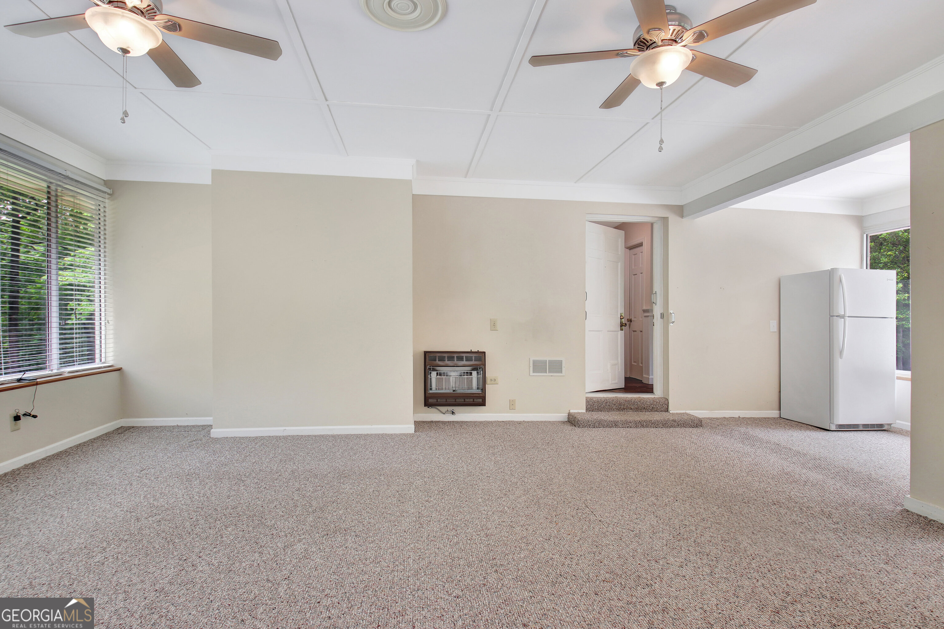 717 Tyrone Road Tyrone, GA 30290 - Photo 39 of 58 a view of an empty room with a window