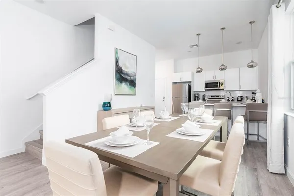 a view of a dining room with furniture