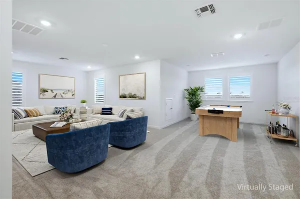an aerial view of a house with a ocean view