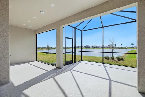 a view of a big building next to a yard