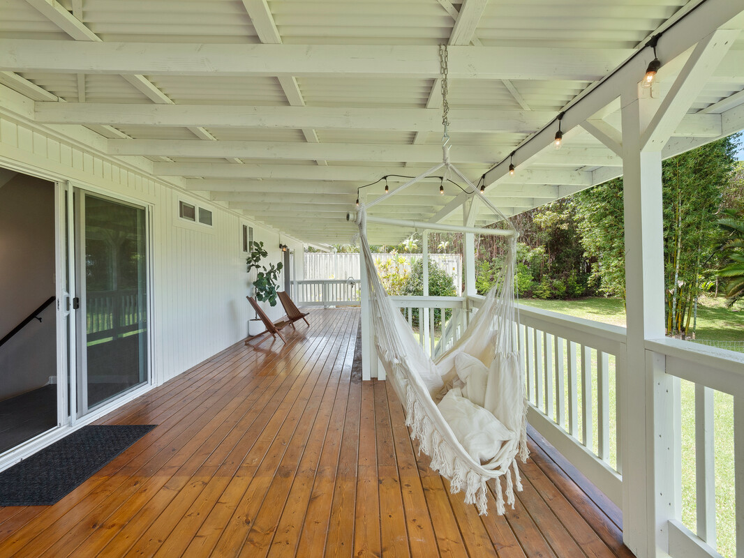 18-4050 North Oshiro Road Mountain View, HI 96771 - Photo 19 of 30 a view of a balcony with wooden floor