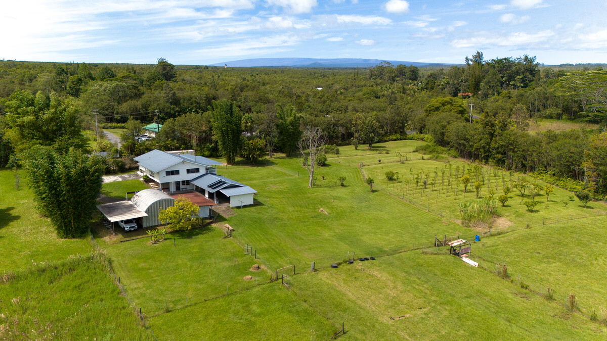 18-4050 North Oshiro Road Mountain View, HI 96771 - Photo 2 of 30 a garden view with a outdoor space