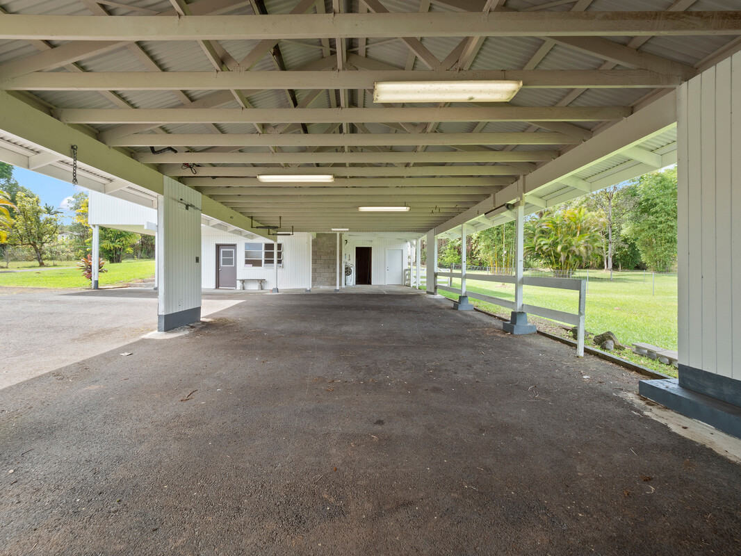 18-4050 North Oshiro Road Mountain View, HI 96771 - Photo 27 of 30 a view of an empty room with a balcony