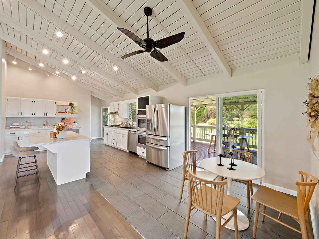 18-4050 North Oshiro Road Mountain View, HI 96771 - Photo 6 of 30 a kitchen with furniture and a window