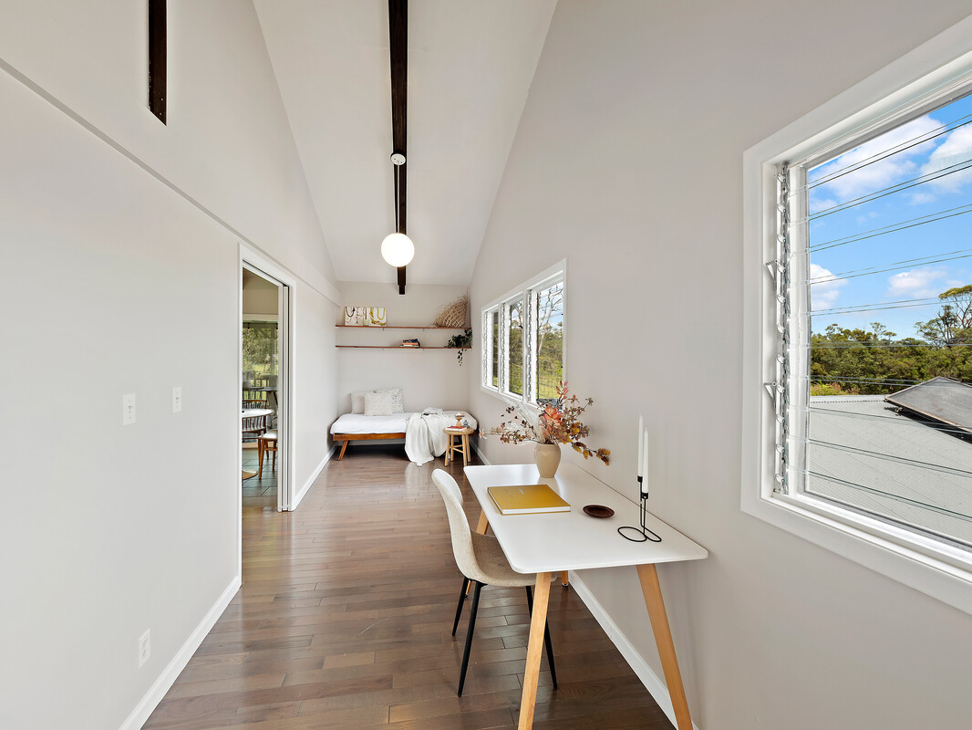 18-4050 North Oshiro Road Mountain View, HI 96771 - Photo 7 of 30 a view of a workspace with furniture and a window