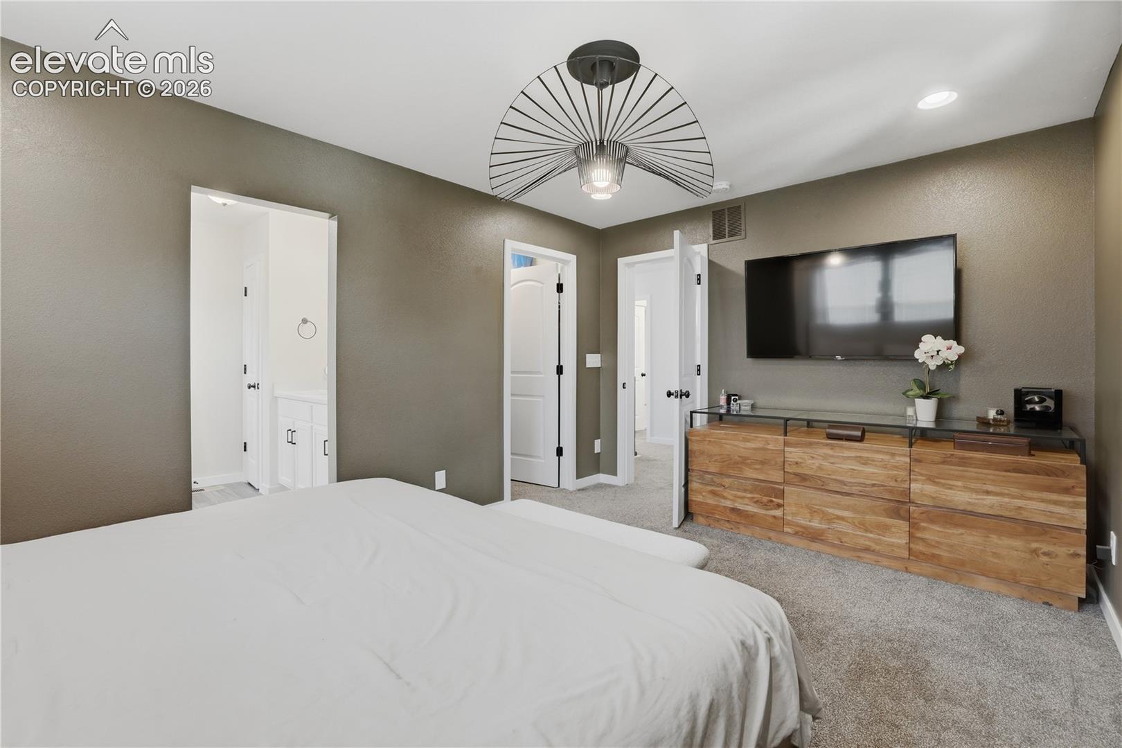 6008 Ashmore Road Colorado Springs, CO 80927 - Photo 21 of 48 Carpeted bedroom featuring an overhead ceiling fixture, recessed lighting, and a neutral wall color