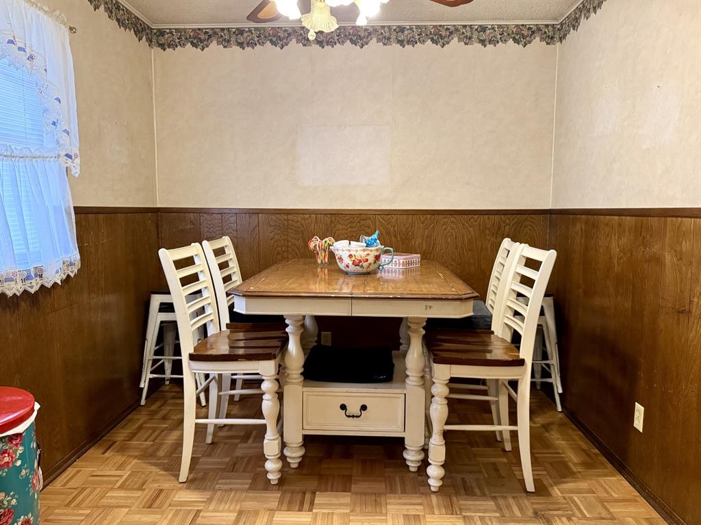 317 North Trail Street Crowley, TX 76036 - Photo 15 of 35 a living room with furniture a piano and a flat screen tv