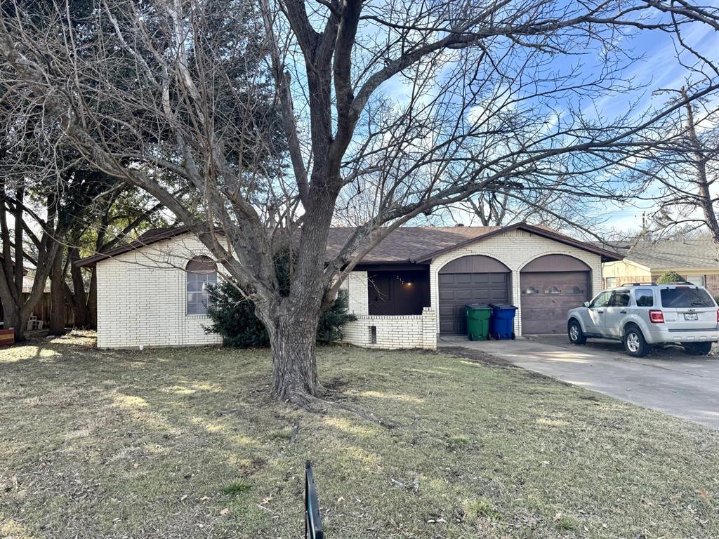 317 North Trail Street Crowley, TX 76036 - Photo 30 of 35 a view of a house with a yard