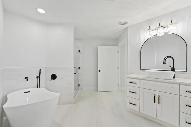 a view of a livingroom with furniture and a fireplace