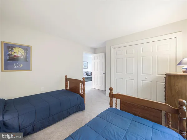 a bedroom with furniture and a couch