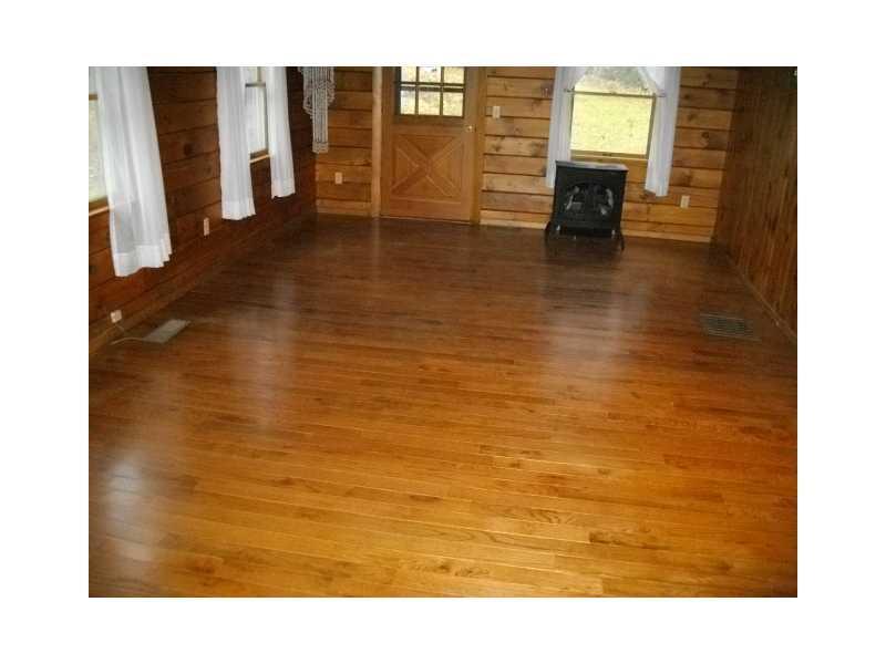 12 Hunk Sawyer Road Bucksport, ME 04416 - Photo 10 of 25 Living Room. New oak/birch hardwood...