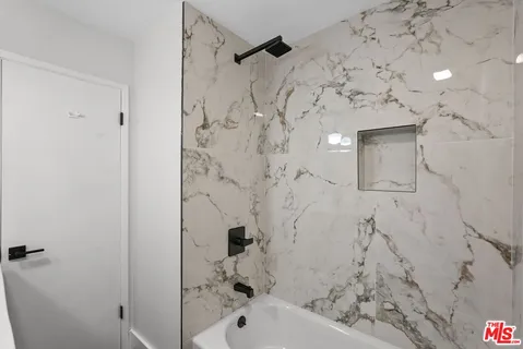 a bathroom with a bathtub