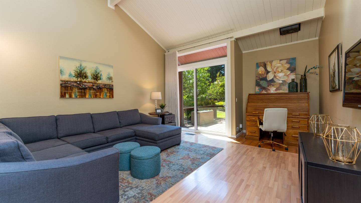 220 Central Avenue Mountain View, CA 94043 - Photo 2 of 22 a living room with furniture and a painting on the wall