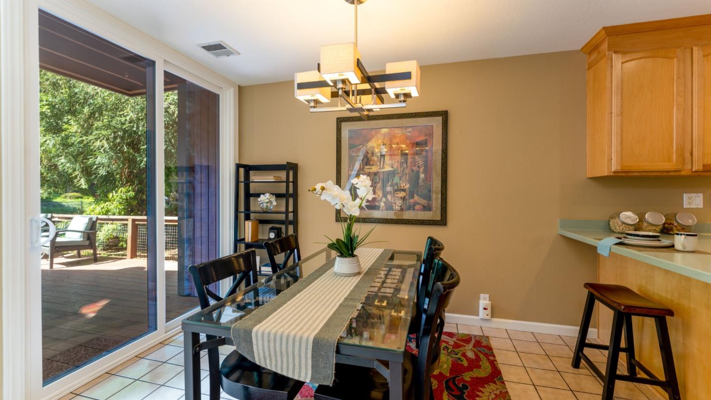 220 Central Avenue Mountain View, CA 94043 - Photo 4 of 22 a view of a dining room with furniture window and outside view
