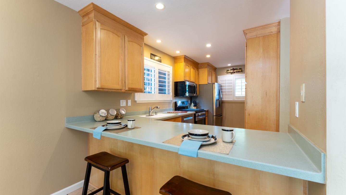 220 Central Avenue Mountain View, CA 94043 - Photo 5 of 22 a kitchen with a sink cabinets and appliances