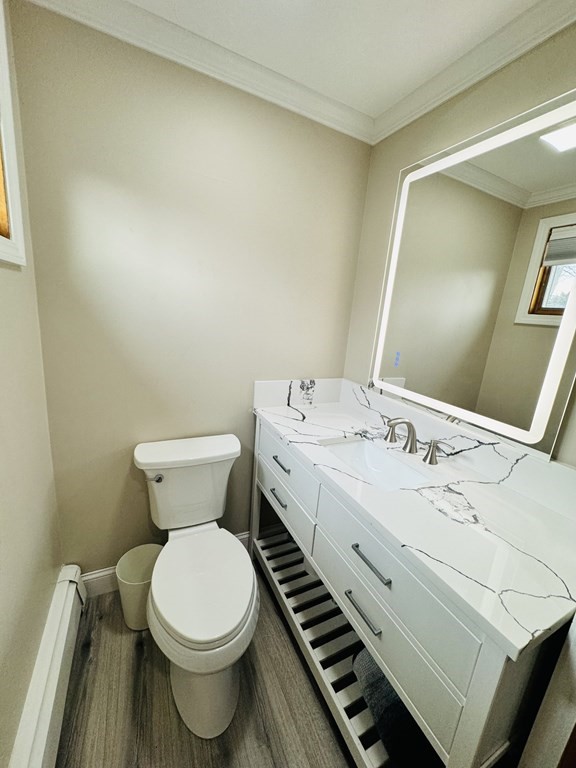 10 Robert Road Framingham, MA 01702 - Photo 14 of 20 a bathroom with a sink and a toilet
