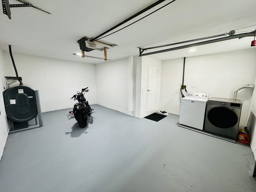 10 Robert Road Framingham, MA 01702 - Photo 18 of 20 a view of a bed and a ceiling fan