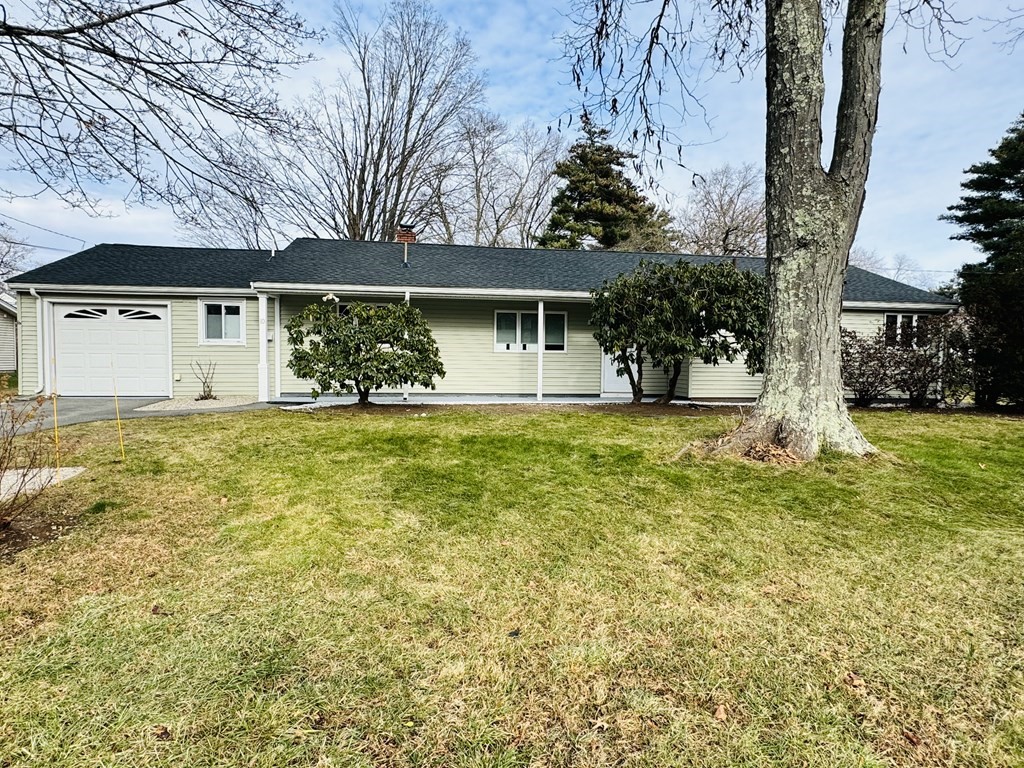 10 Robert Road Framingham, MA 01702 - Photo 2 of 20 a house view with a garden space