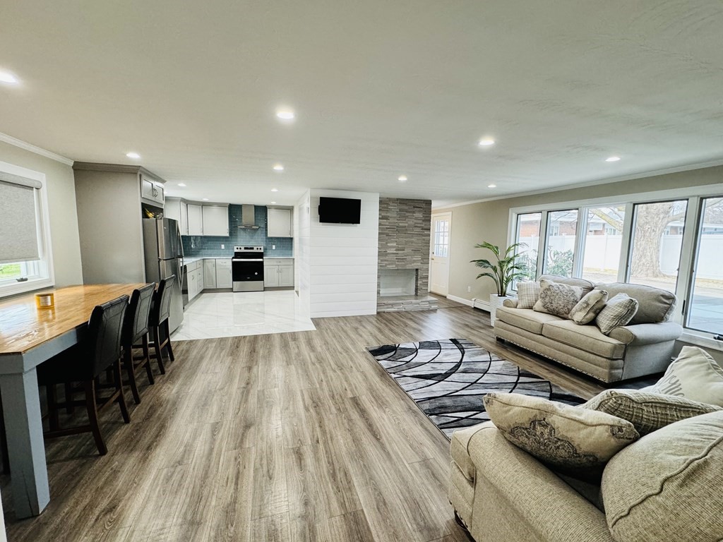 10 Robert Road Framingham, MA 01702 - Photo 3 of 20 a living room with furniture and a table