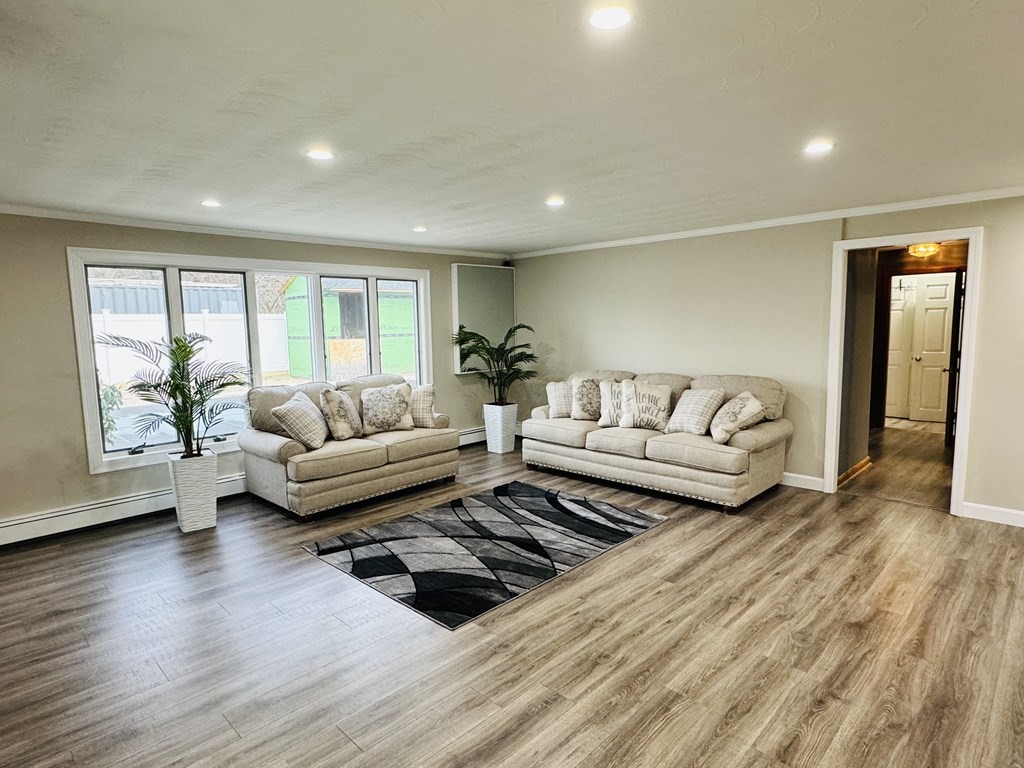 10 Robert Road Framingham, MA 01702 - Photo 5 of 20 a living room with furniture and a large window