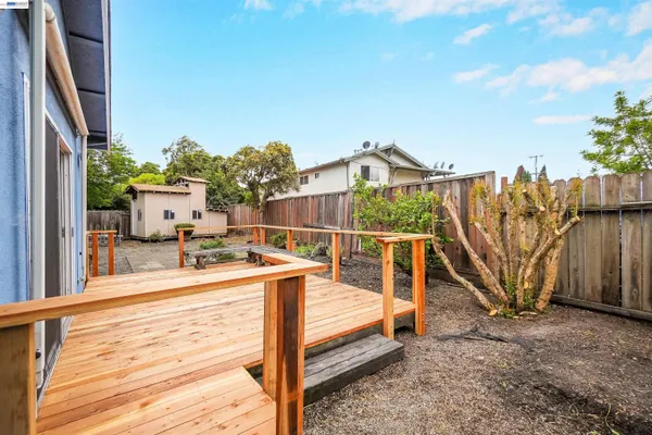 an aerial view of a house with a swimming pool yard and outdoor seating