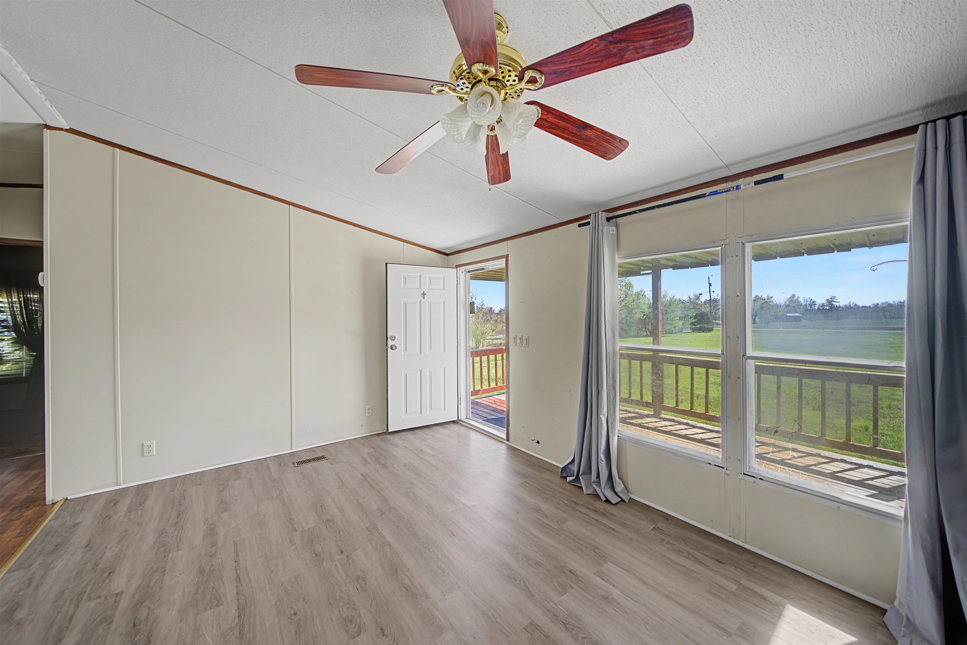 1788 Nichols Road Guys, TN 38339 - Photo 11 of 21 Unfurnished room with light wood finished floors and a ceiling fan
