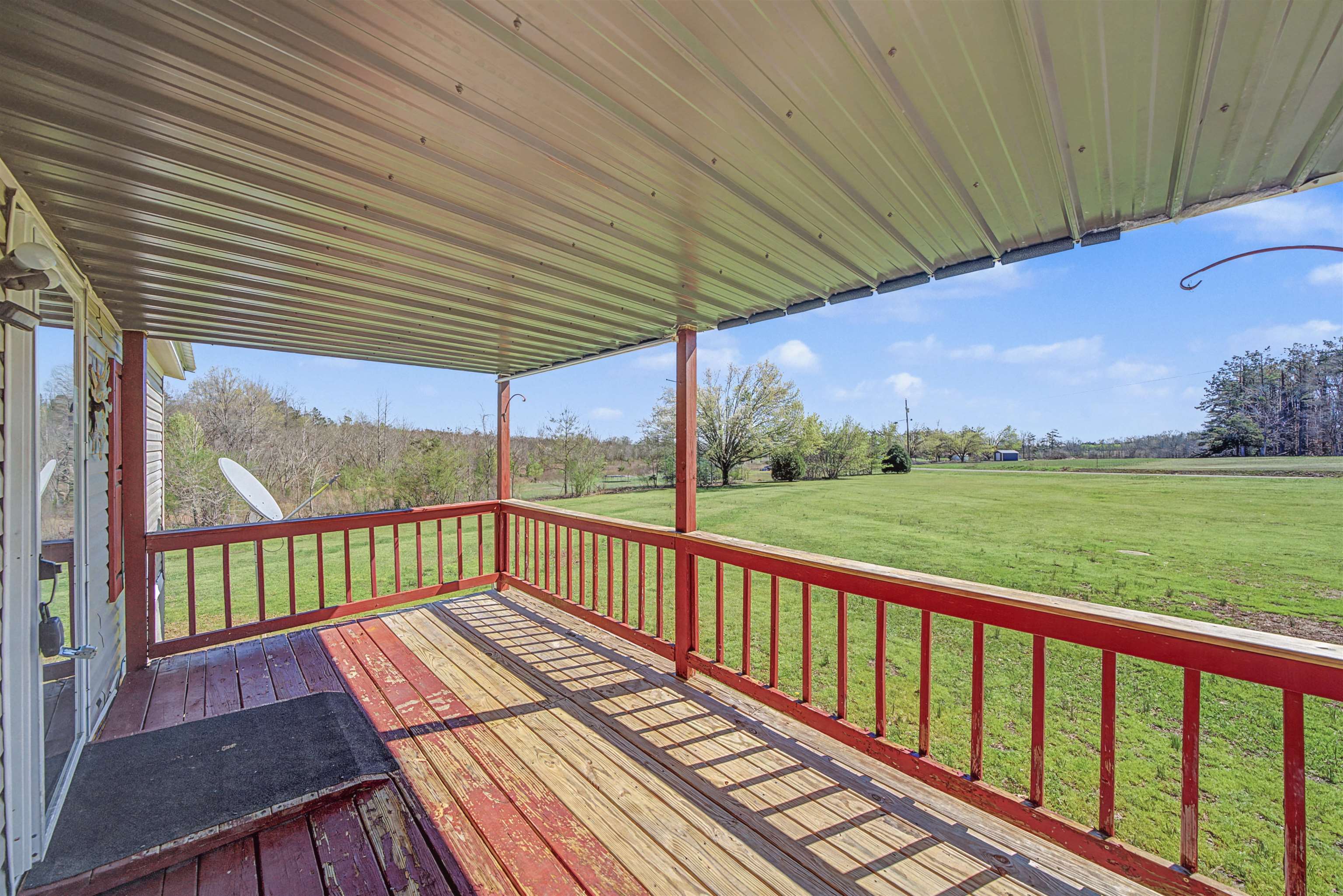 1788 Nichols Road Guys, TN 38339 - Photo 9 of 21 Wooden terrace with a lawn