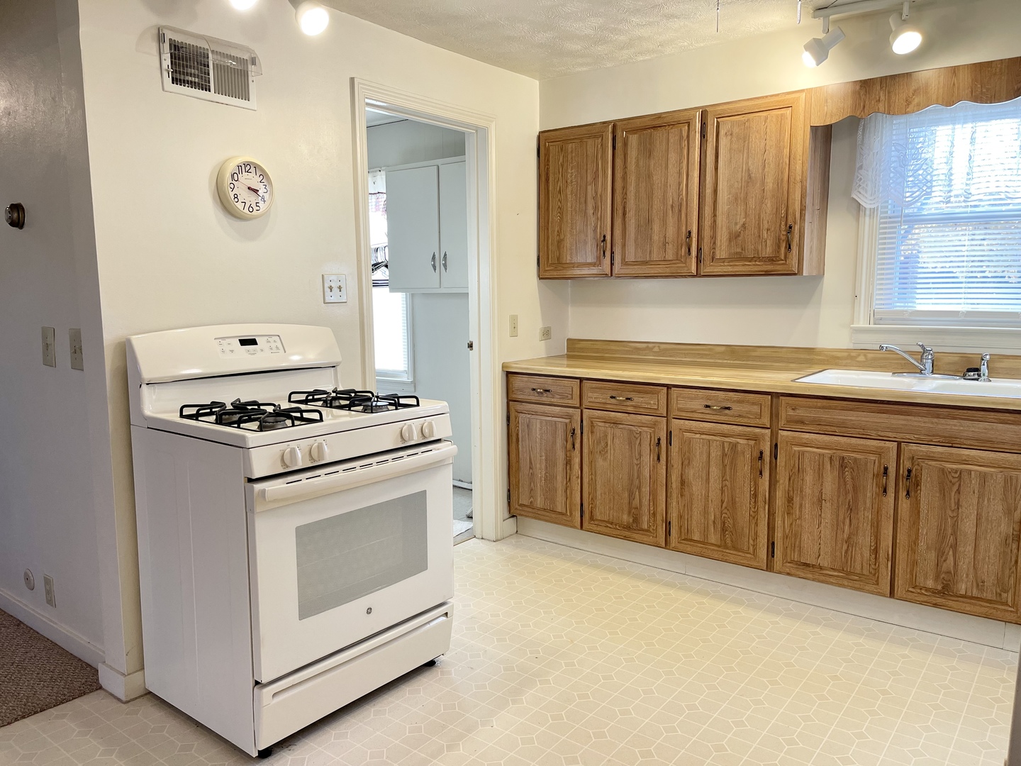 735 3rd Avenue Ottawa, IL 61350 - Photo 2 of 18 a kitchen with cabinets and appliances