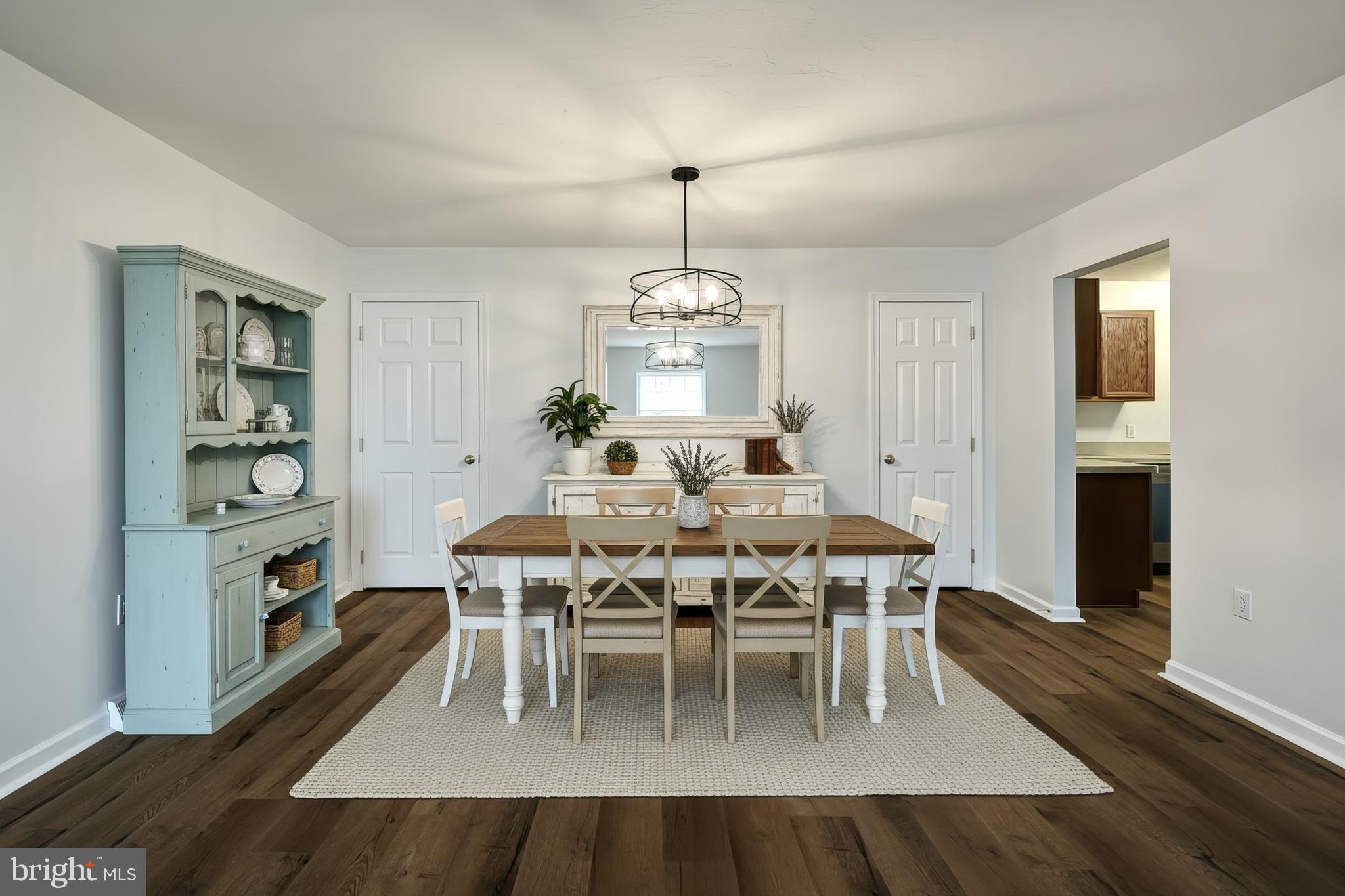 7220 Seneca Ridge Drive York, PA 17403 - Photo 14 of 51 a dining room with furniture a rug and wooden floor
