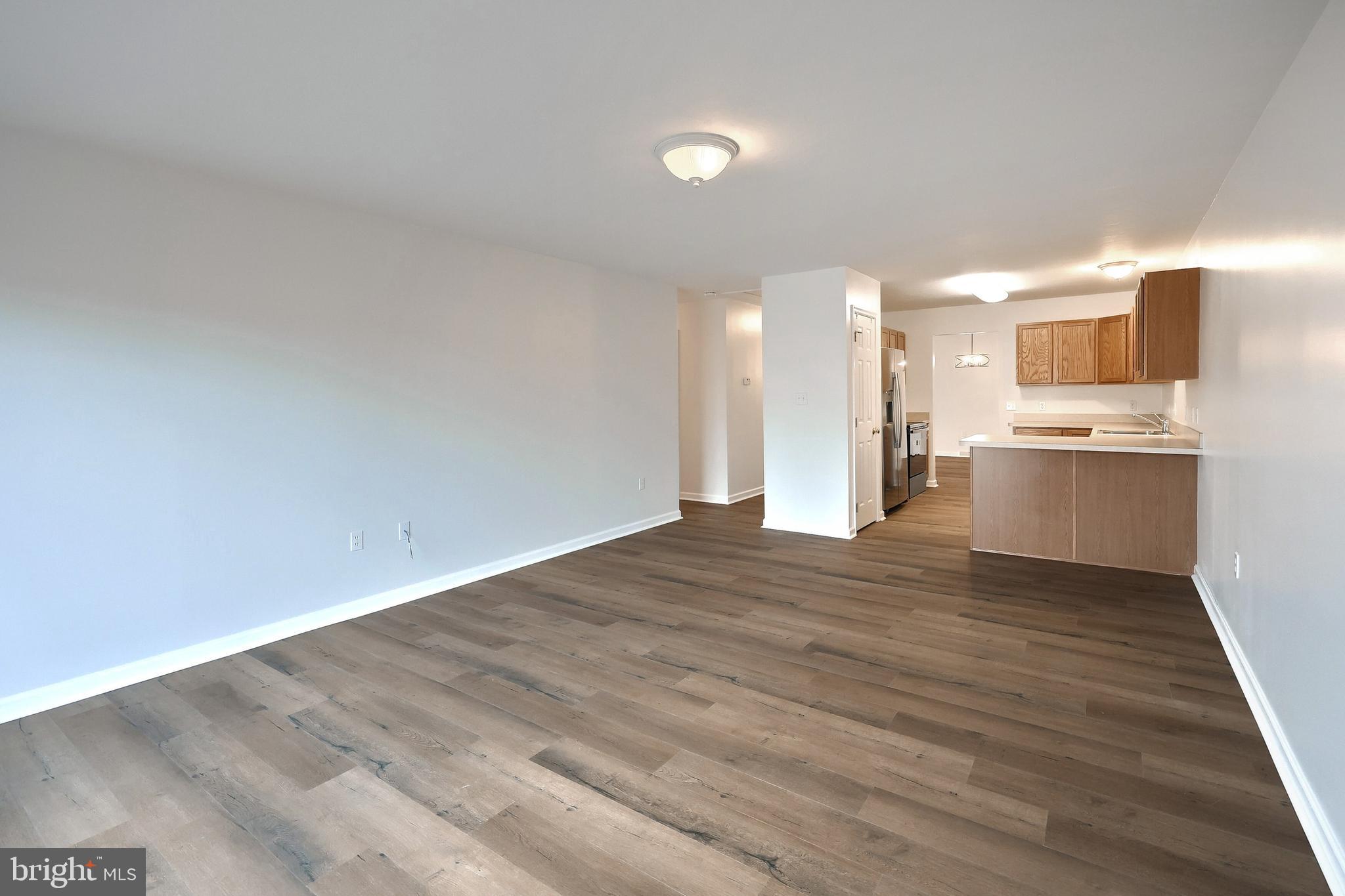 7220 Seneca Ridge Drive York, PA 17403 - Photo 21 of 51 a view of a kitchen with a sink and a refrigerator