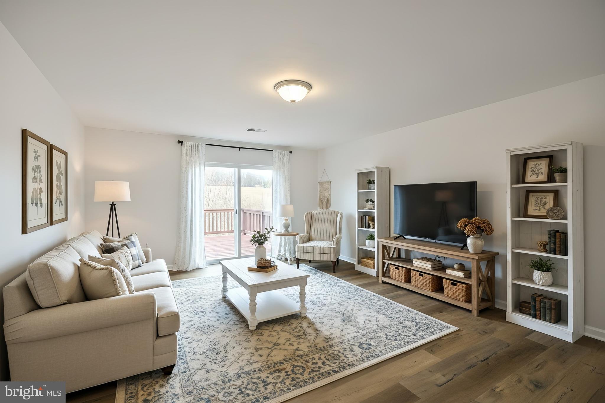 7220 Seneca Ridge Drive York, PA 17403 - Photo 22 of 51 a living room with furniture and a flat screen tv