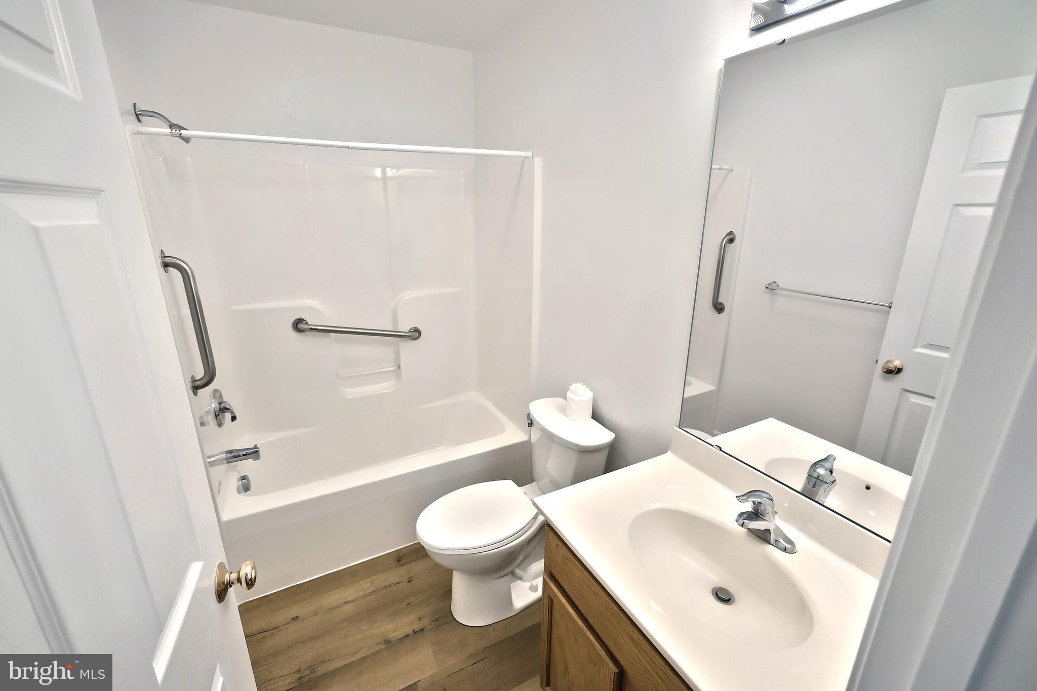 7220 Seneca Ridge Drive York, PA 17403 - Photo 26 of 51 a white toilet sitting next to a bathroom sink