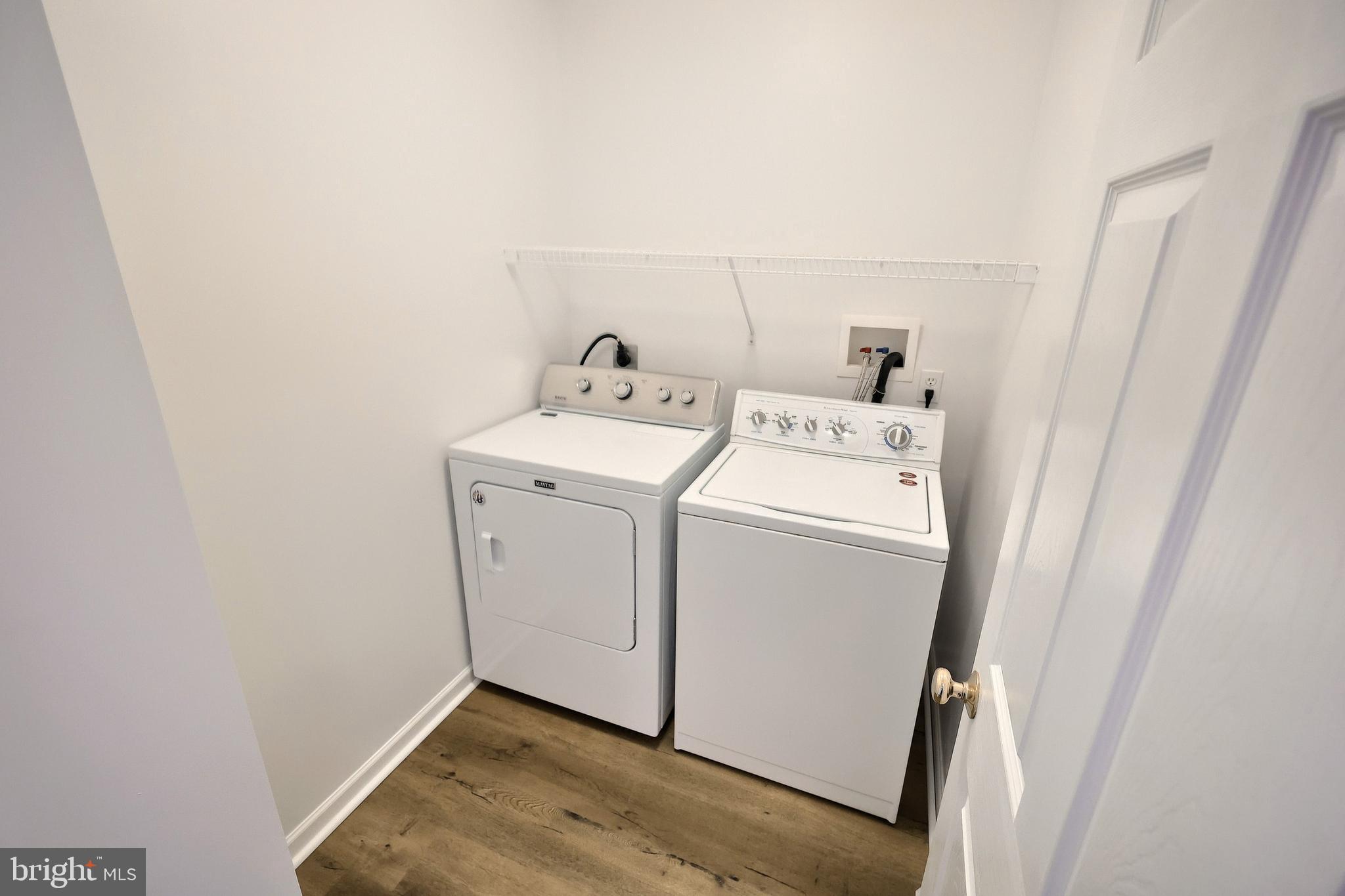 7220 Seneca Ridge Drive York, PA 17403 - Photo 27 of 51 a utility room with dryer and washer