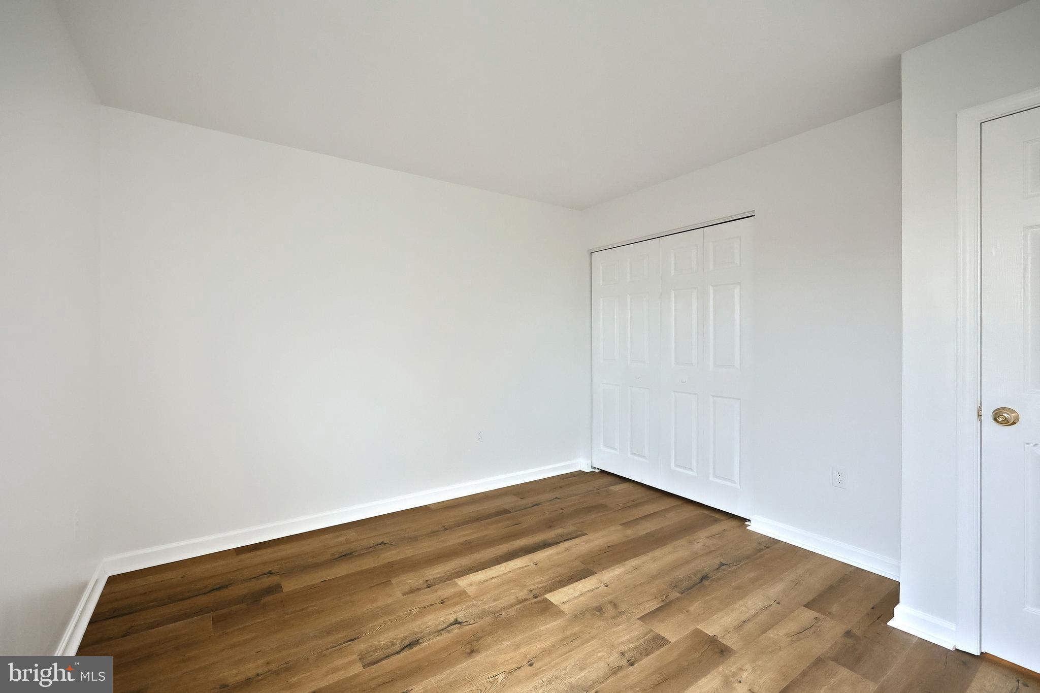 7220 Seneca Ridge Drive York, PA 17403 - Photo 29 of 51 a view of empty room with wooden floor