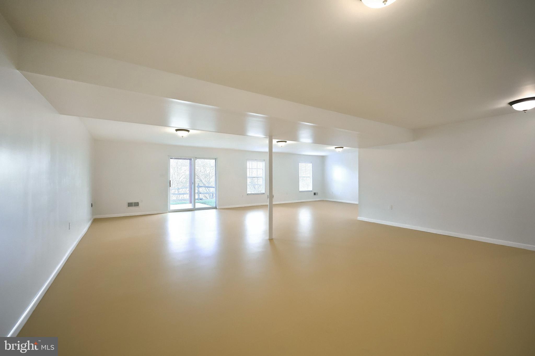 7220 Seneca Ridge Drive York, PA 17403 - Photo 35 of 51 wooden floor in an empty room with a window