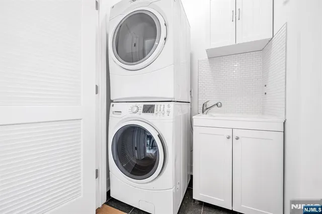 a utility room with dryer and washer