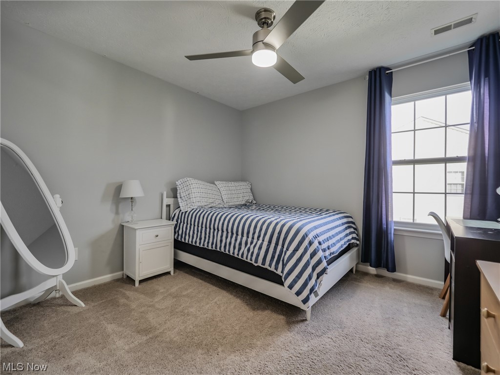 37571 Amber Way North Ridgeville, OH 44039 - Photo 23 of 35 Carpeted bedroom featuring ceiling fan