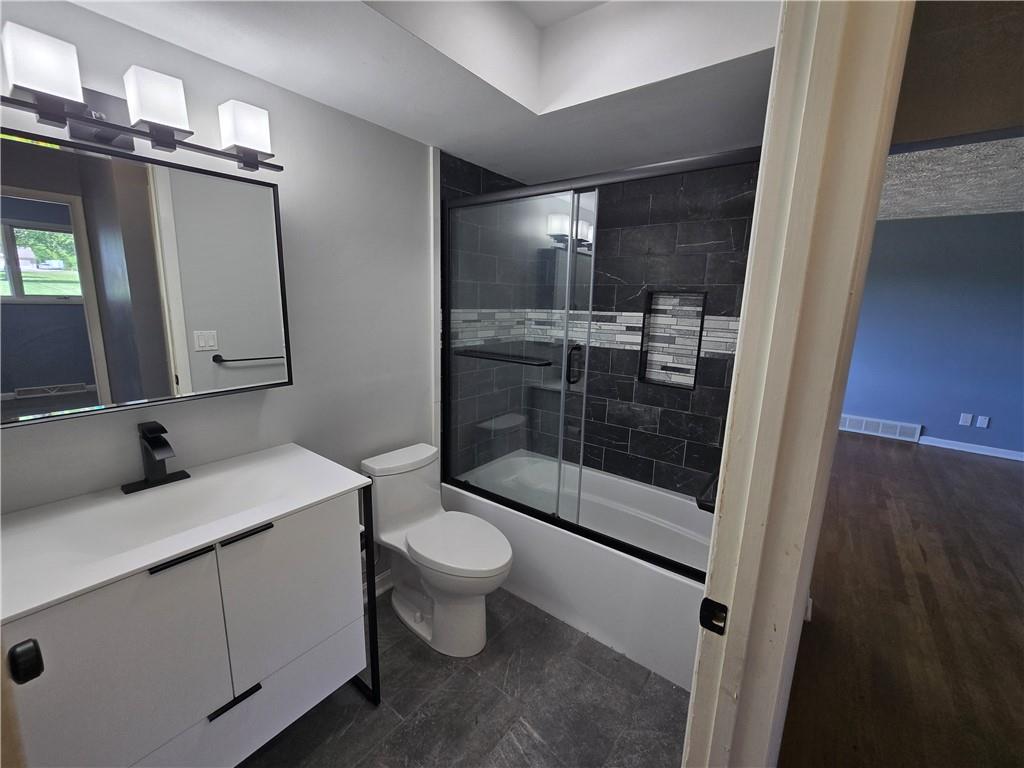 740 South Keel Ridge Road Hermitage, PA 16148 - Photo 15 of 33 a bathroom with a sink a toilet and shower