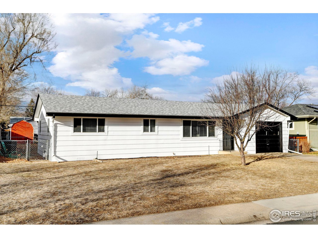 413 Riddle Drive Fort Collins, CO 80521 - Photo 16 of 33 Brand new fresh exterior paint and roof and windows have been updated.