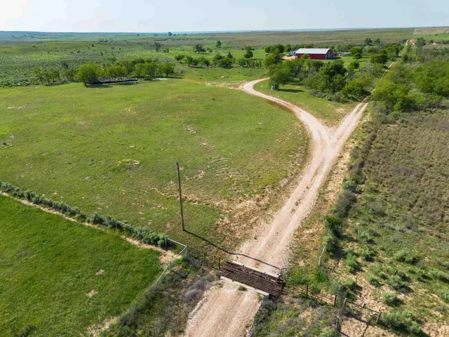 a view of an ocean from a mountain