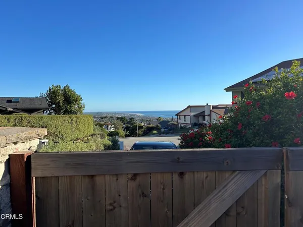 a view of a balcony with city view
