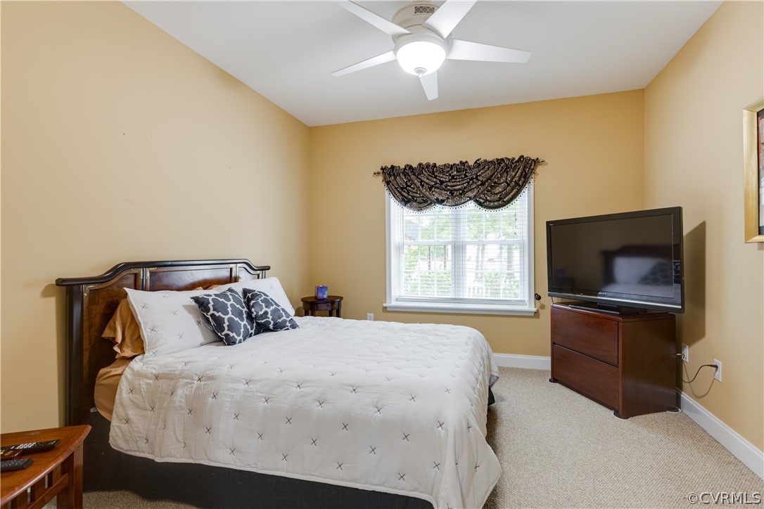 5924 Springmount Road Chesterfield, VA 23832 - Photo 12 of 49 a bedroom with a bed and tv